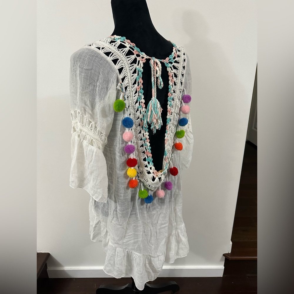 White Crochet Cover-Up with Colorful Pom Poms